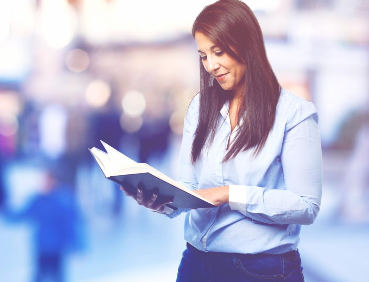 Family reviewing budget documents together at kitchen table